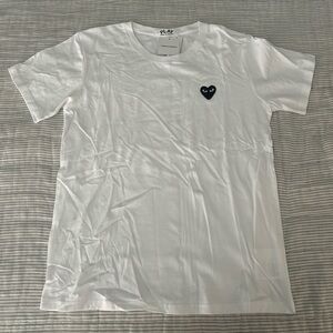 Comme de Garçons white tee. Fits as a Medium